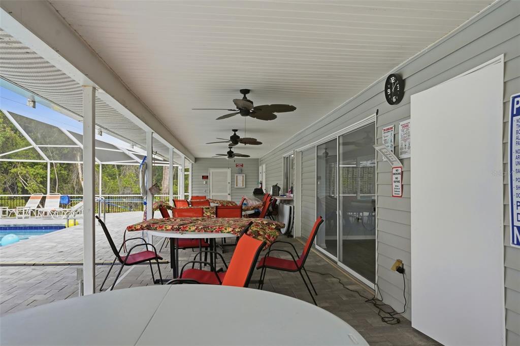 5161 Forest Glenn Drive Spring Hill, FL 34607 - Photo 45 of 51 a outdoor space with chairs