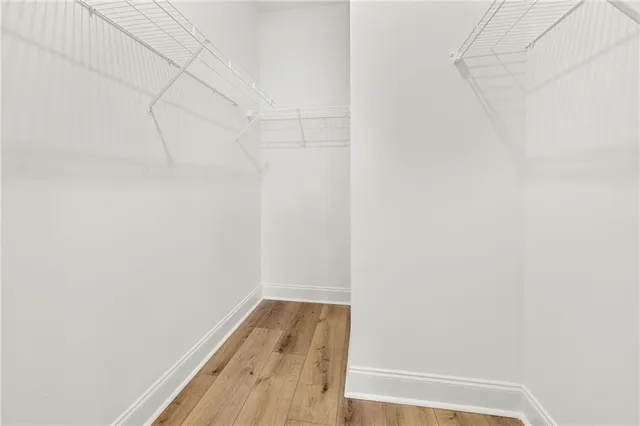 a view of swimming pool next to a yard