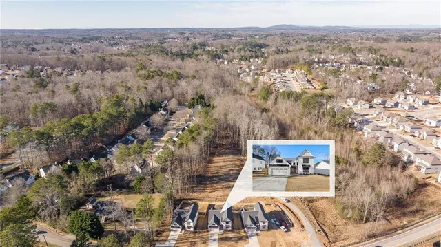 a view of city with ocean