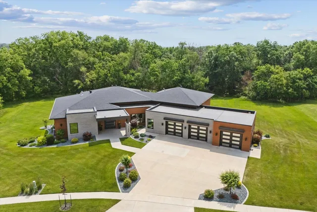 a view of a house with a garden