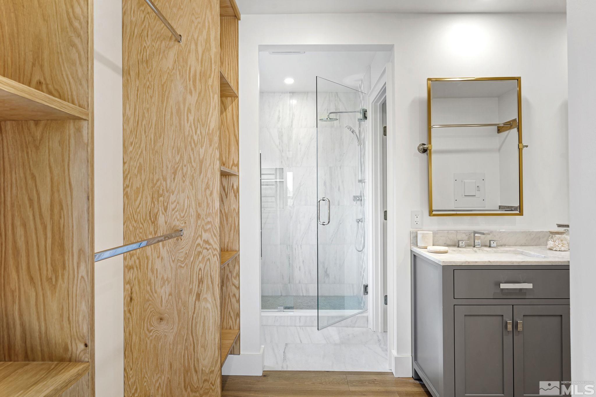 2620 Del Monte Lane Reno, NV 89511 - Photo 25 of 40 a bathroom with a shower and a sink