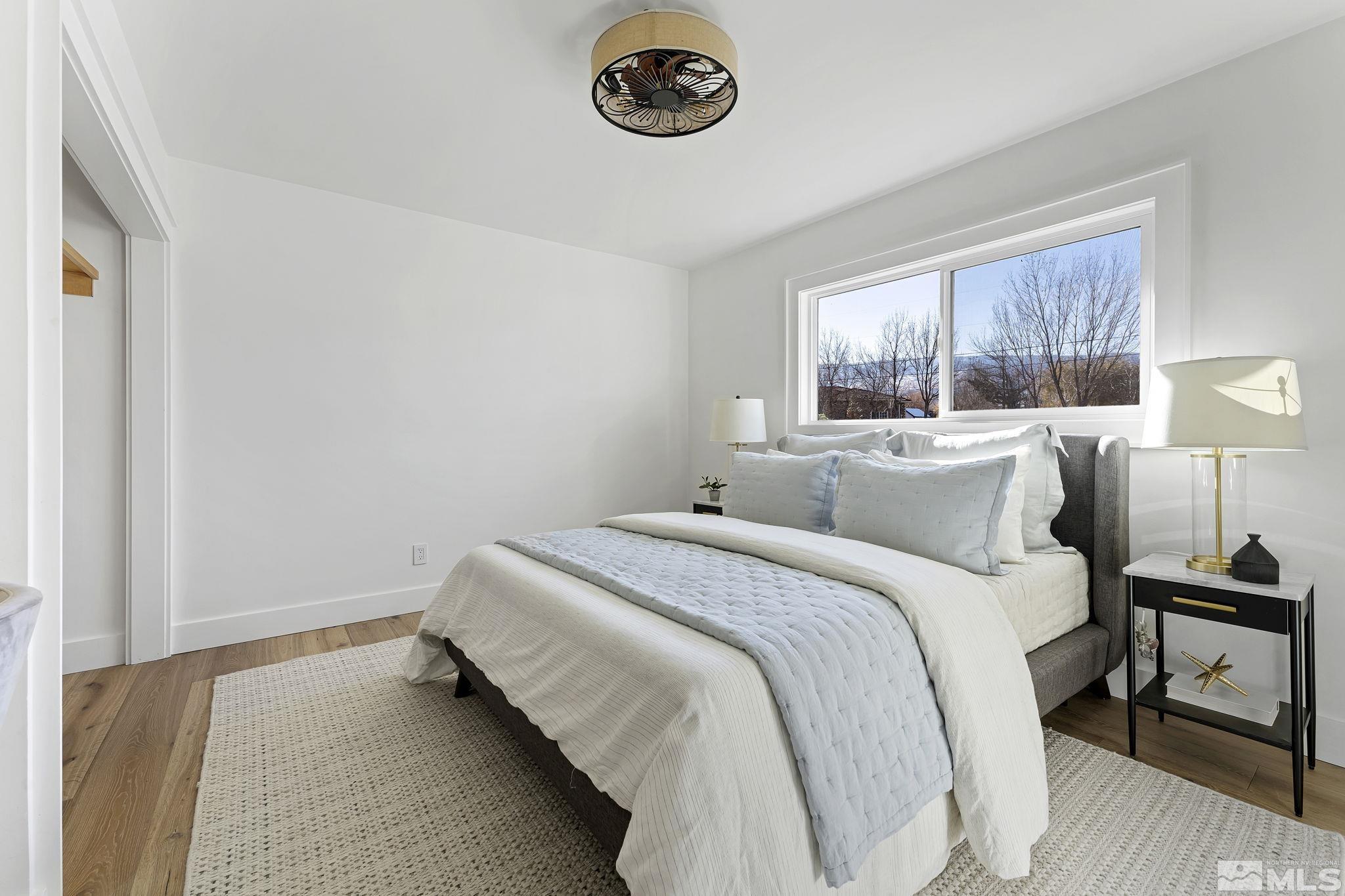 2620 Del Monte Lane Reno, NV 89511 - Photo 26 of 40 a bedroom with a bed and a window