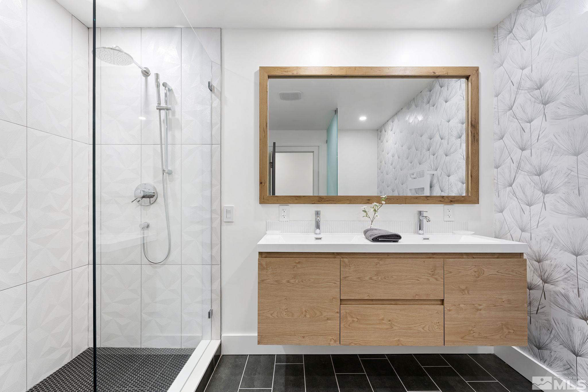 2620 Del Monte Lane Reno, NV 89511 - Photo 28 of 40 a bathroom with a sink and a mirror