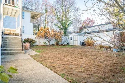 a view of backyard of the house