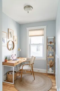 a workspace with furniture and window