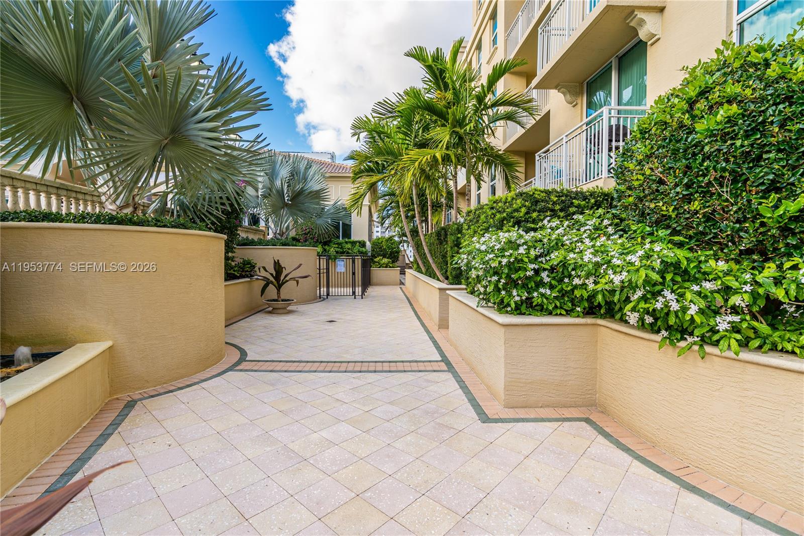 99 Southeast Mizner Boulevard, Unit 409 Boca Raton, FL 33432 - Photo 22 of 26 a view of outdoor space and yard