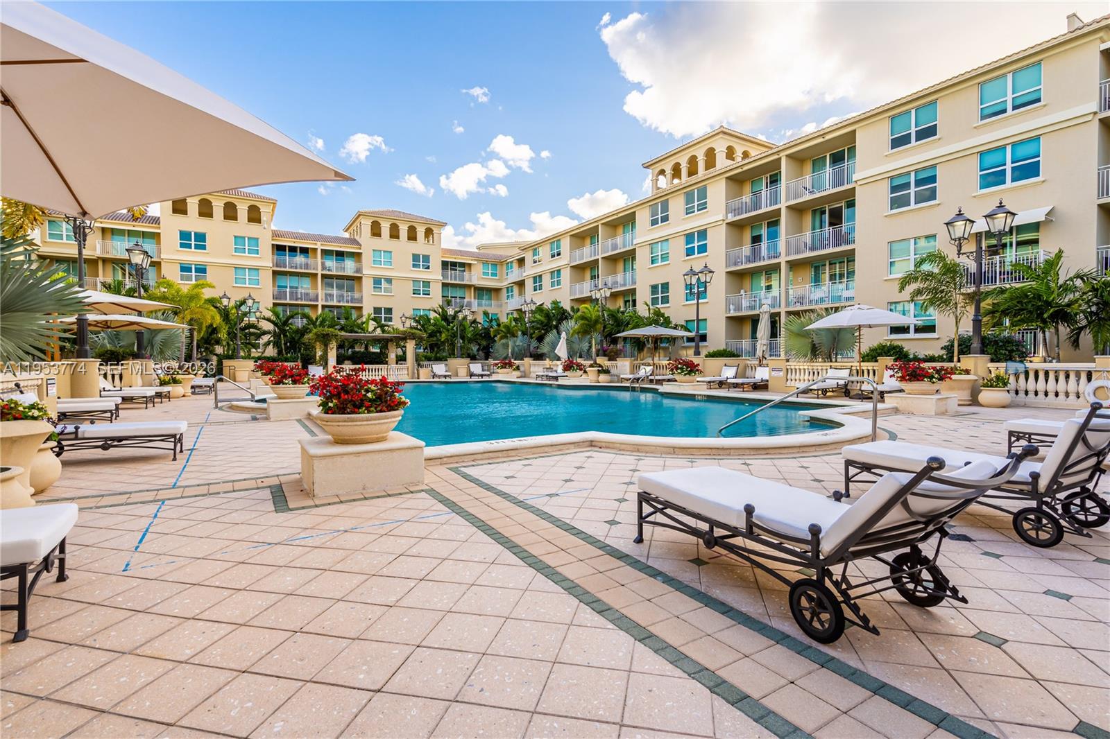 99 Southeast Mizner Boulevard, Unit 409 Boca Raton, FL 33432 - Photo 24 of 26 a outdoor space with lots of tables and chairs