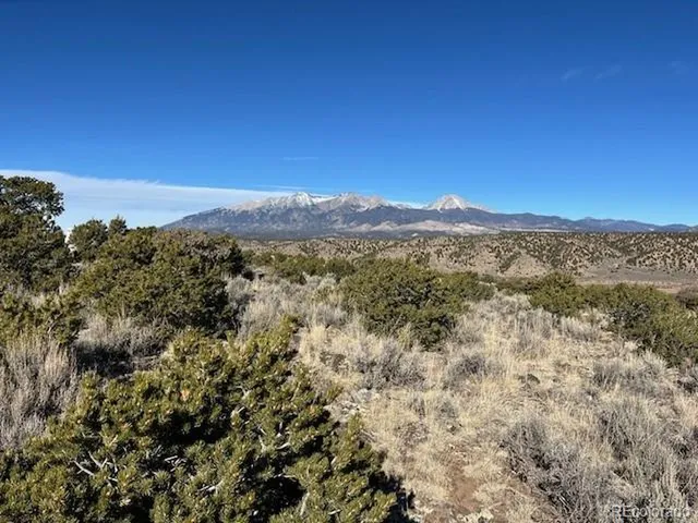 a view of mountain view with mountains in the background