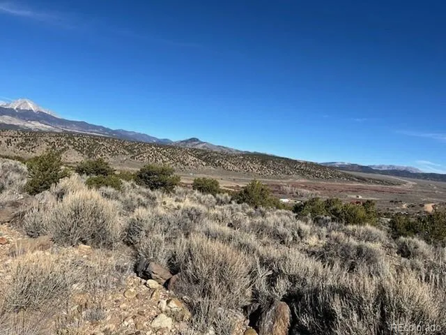 a view of mountain view with mountains in the background