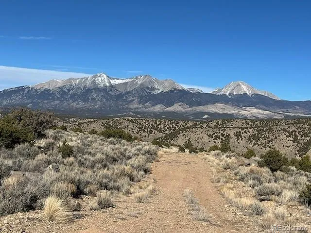 a view of a large mountains with a mountain in the background