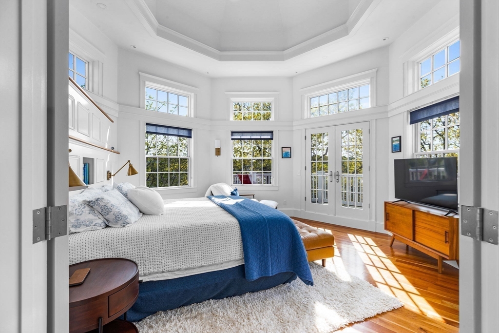1 R Bailey's Island Road Scituate, MA 02066 - Photo 20 of 42 a bedroom with a bed and wooden floor