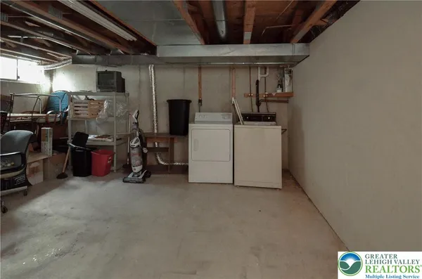 a view of storage and utility room with racks