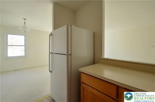 a view of walk in closet with window