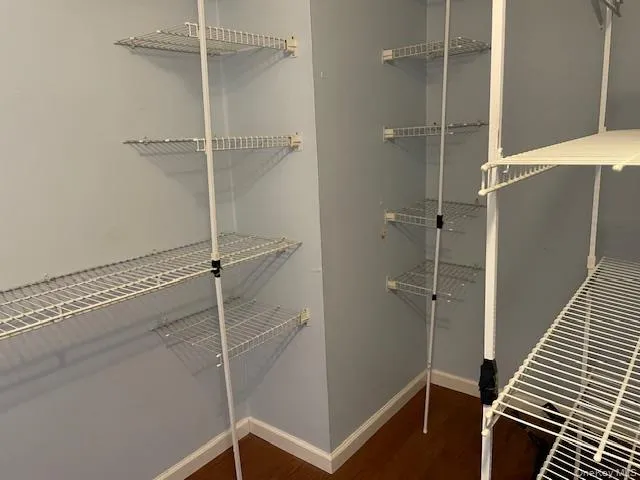 a bathroom with a shower and a glass door