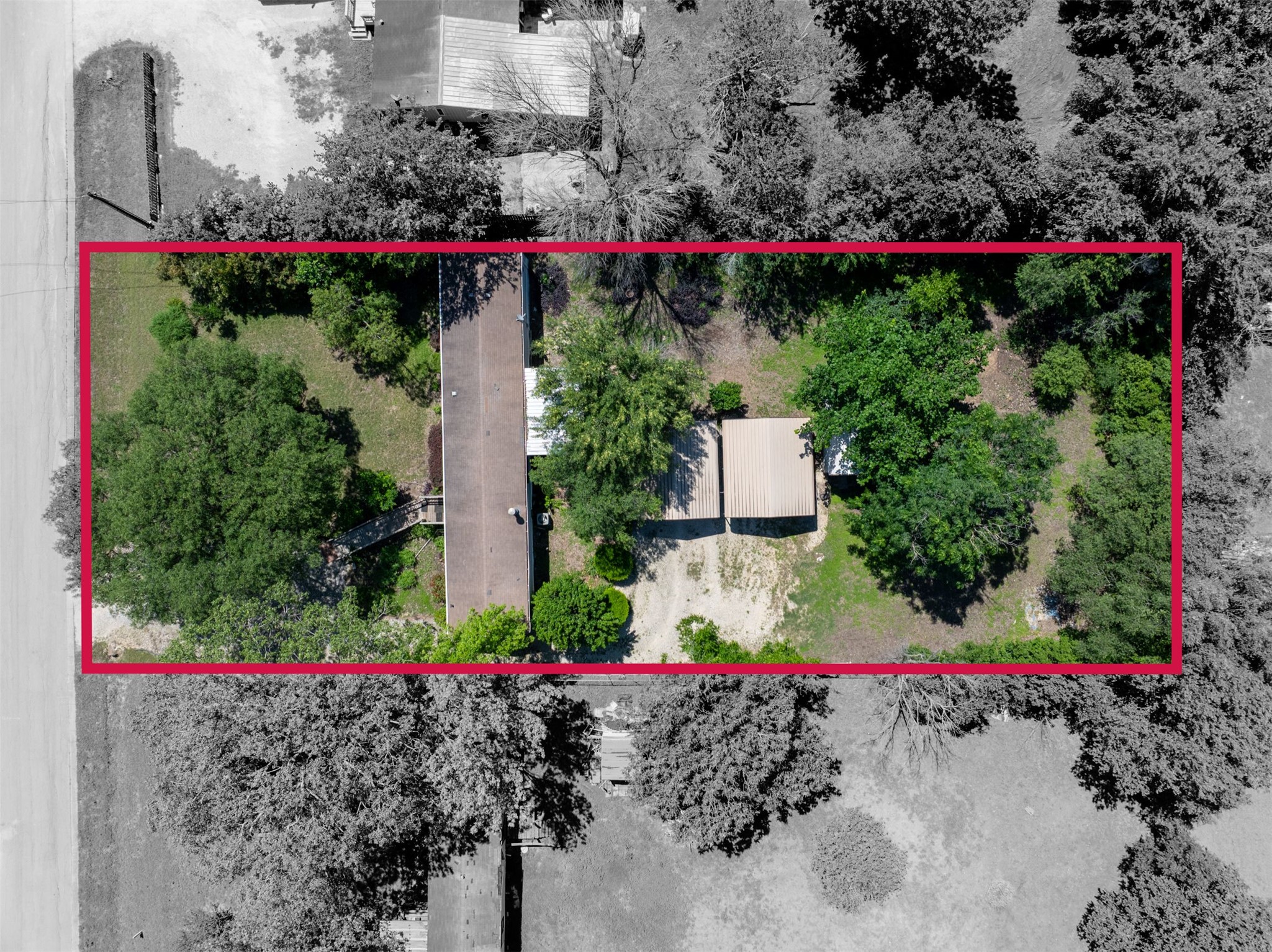 258 Quail Ridge Drive Kyle, TX 78640 - Photo 11 of 11 Aerial overview showcasing a substantial property with extensive tree coverage