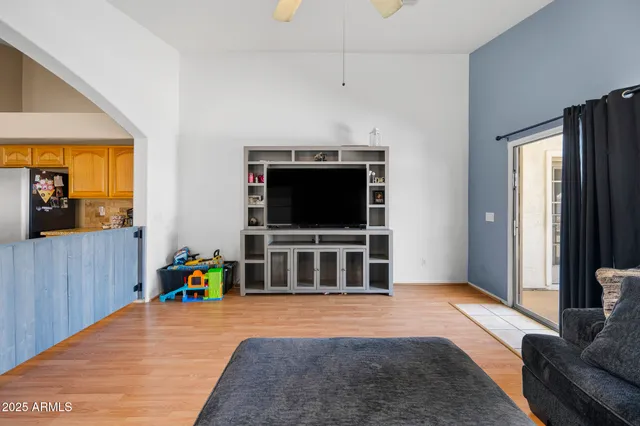 a living room with furniture and a window
