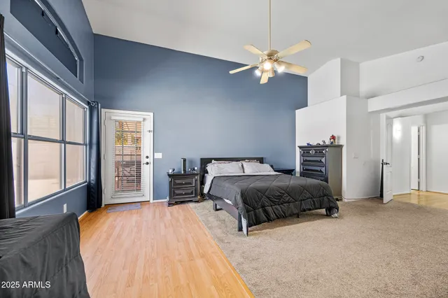 a large bathroom with a large tub and sink