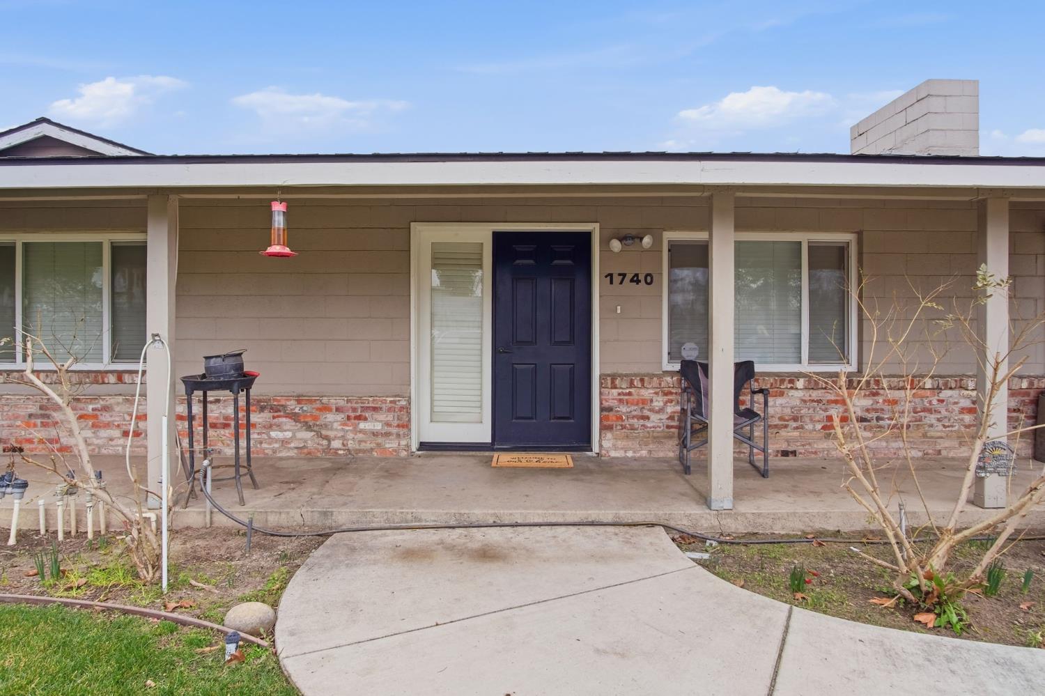 1740 Colorado Avenue Turlock, CA 95382 - Photo 4 of 37 front view of house with a outdoor space
