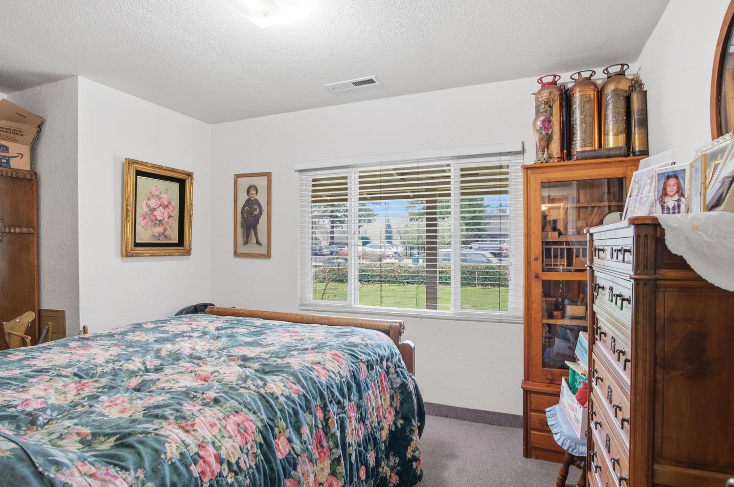 1740 Colorado Avenue Turlock, CA 95382 - Photo 9 of 37 a bedroom with a bed and a window