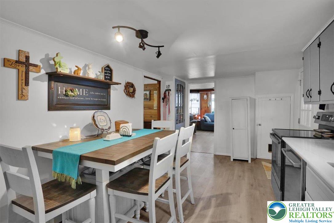 1825 Moselem Spring Road Hamburg, PA 19526 - Photo 14 of 24 a view of a dining room with furniture and wooden floor