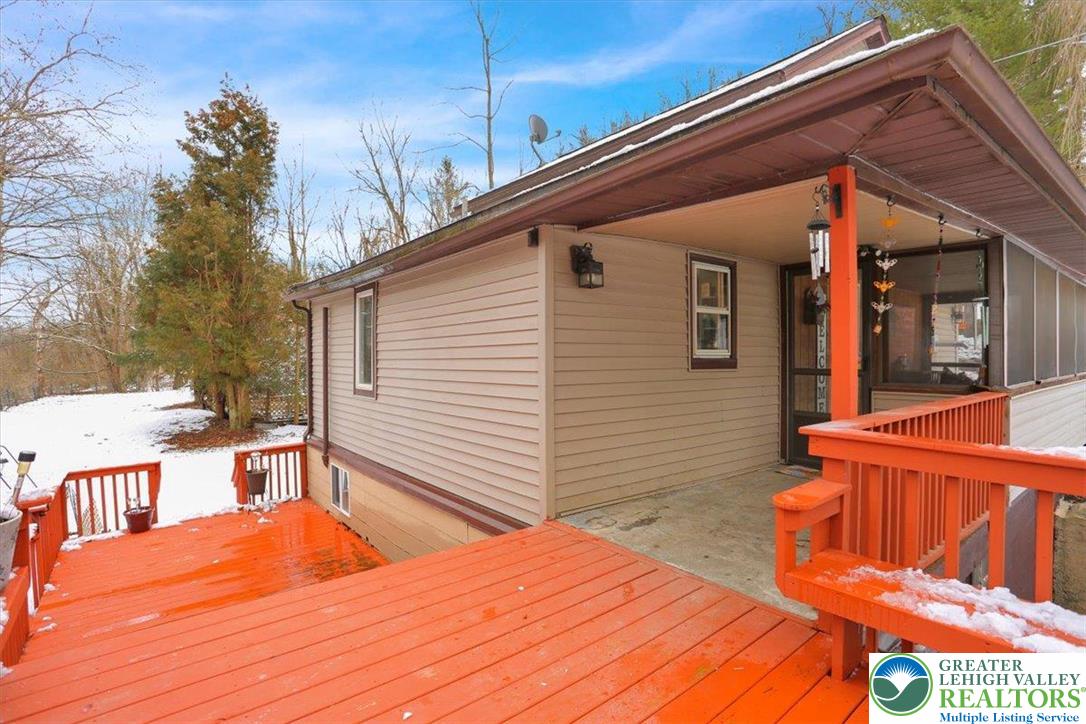 1825 Moselem Spring Road Hamburg, PA 19526 - Photo 20 of 24 a backyard of a house with wooden floor and outdoor seating
