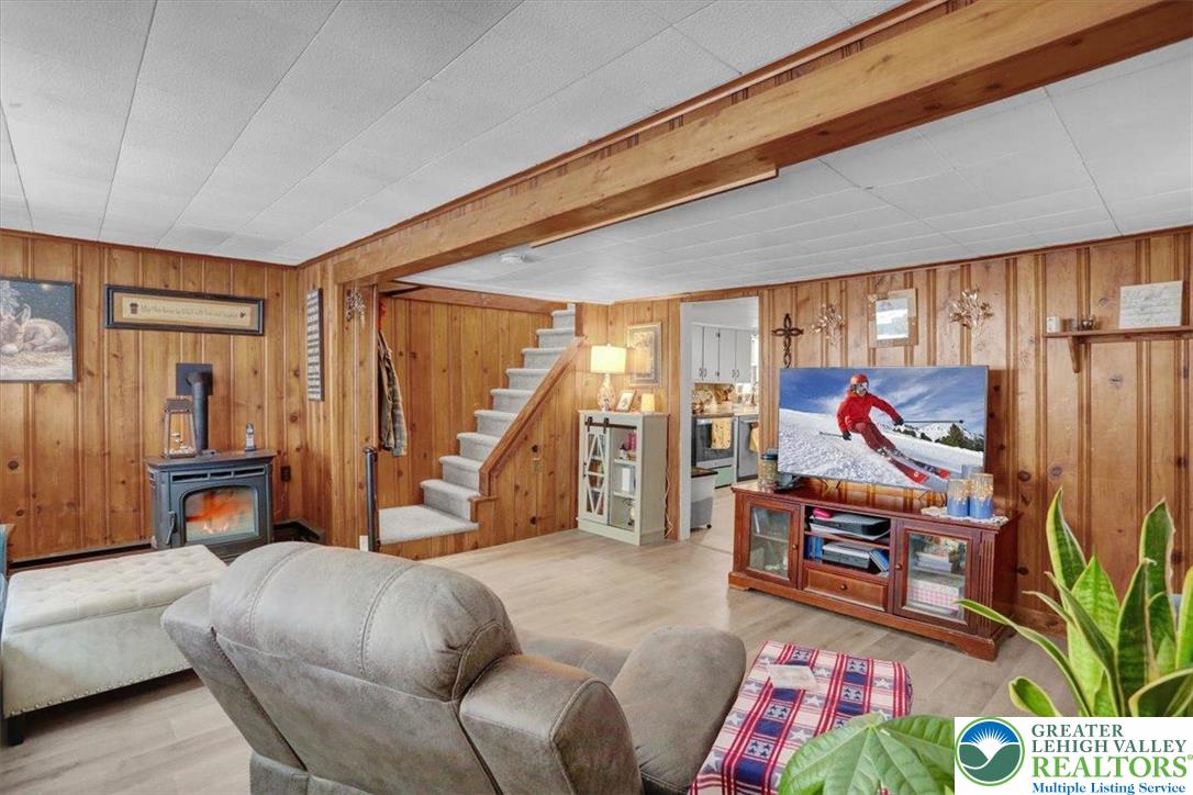 1825 Moselem Spring Road Hamburg, PA 19526 - Photo 6 of 24 a living room with furniture a rug and a large window