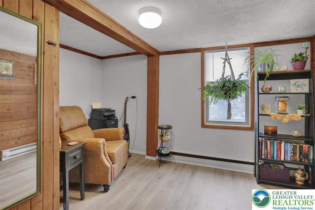 1825 Moselem Spring Road Hamburg, PA 19526 - Photo 8 of 24 a room with furniture and a window