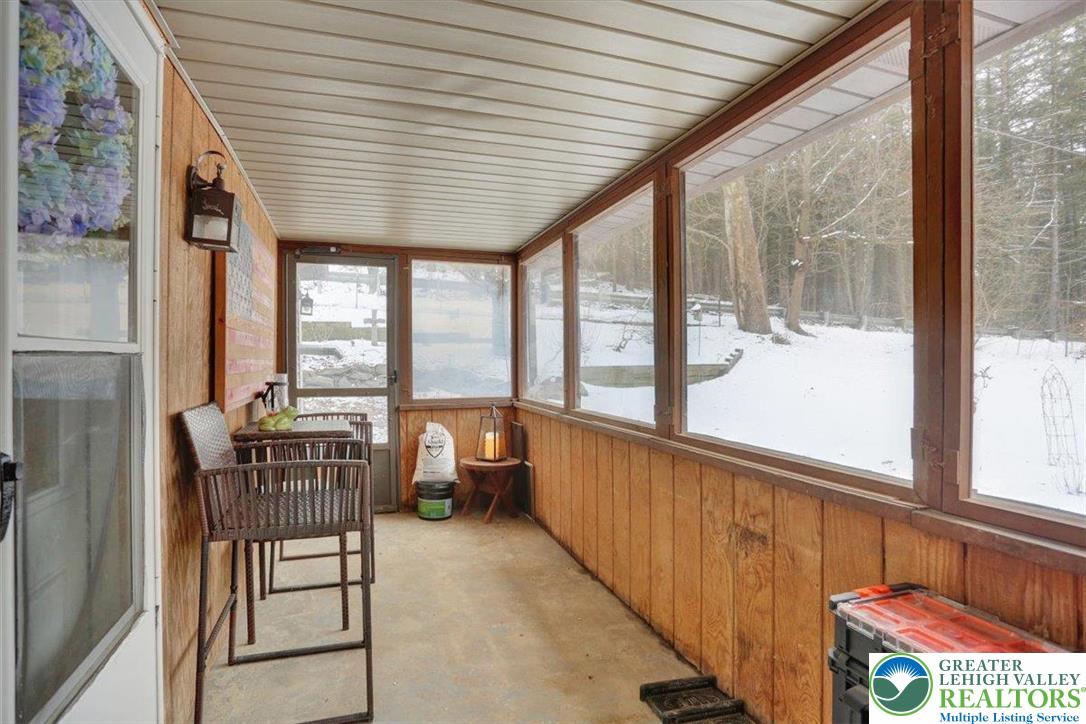1825 Moselem Spring Road Hamburg, PA 19526 - Photo 10 of 24 a living room with furniture and floor to ceiling windows