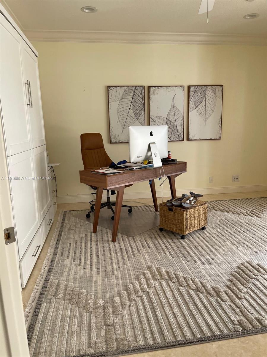 5565 Northeast Trieste Way Boca Raton, FL 33487 - Photo 14 of 30 a living room with couch and a table