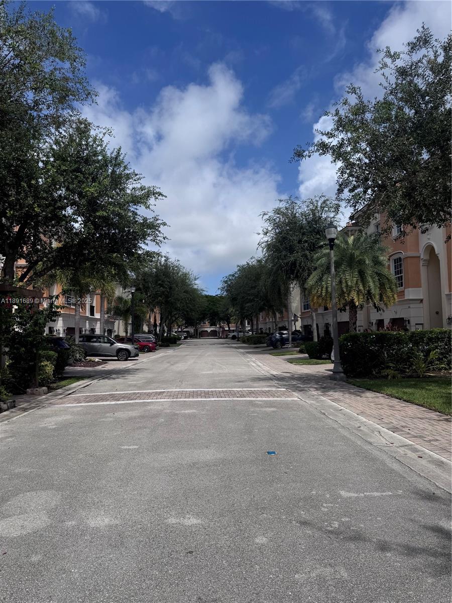 5565 Northeast Trieste Way Boca Raton, FL 33487 - Photo 28 of 30 a view of street with houses