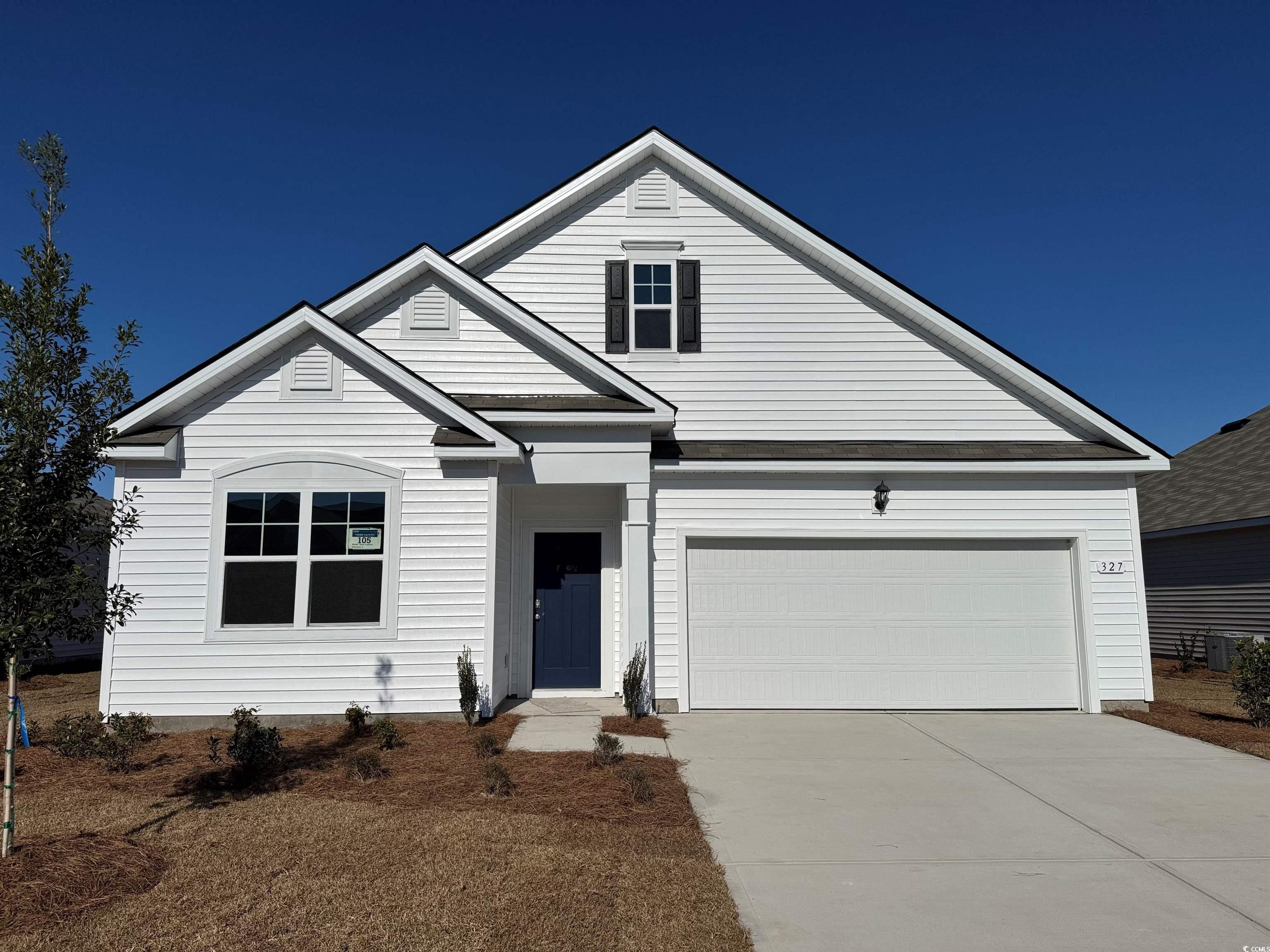 327 Cheerful Way Little River, SC 29566 - Photo 1 of 24 View of front of property featuring driveway