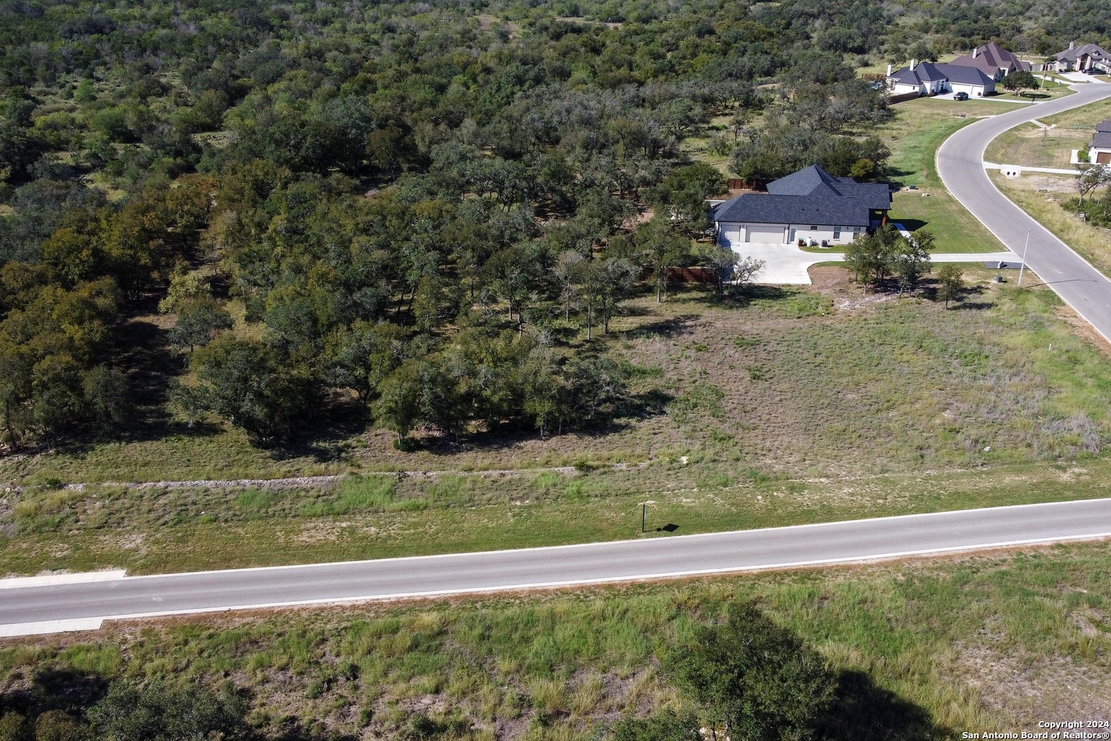 Lot 22 Stone Loop Castroville, TX 78009 - Photo 4 of 5 a view of a yard with an outdoor space