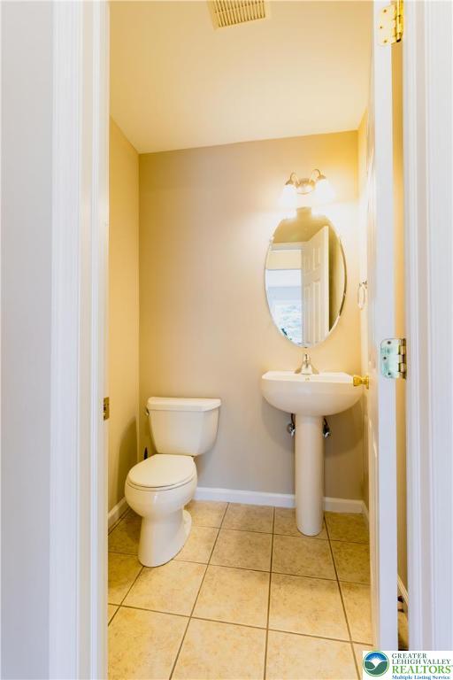4138 Walter Road Bethlehem, PA 18020 - Photo 17 of 39 a bathroom with a sink and a toilet