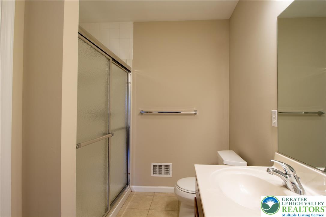 4138 Walter Road Bethlehem, PA 18020 - Photo 24 of 39 a bathroom with a sink and a mirror