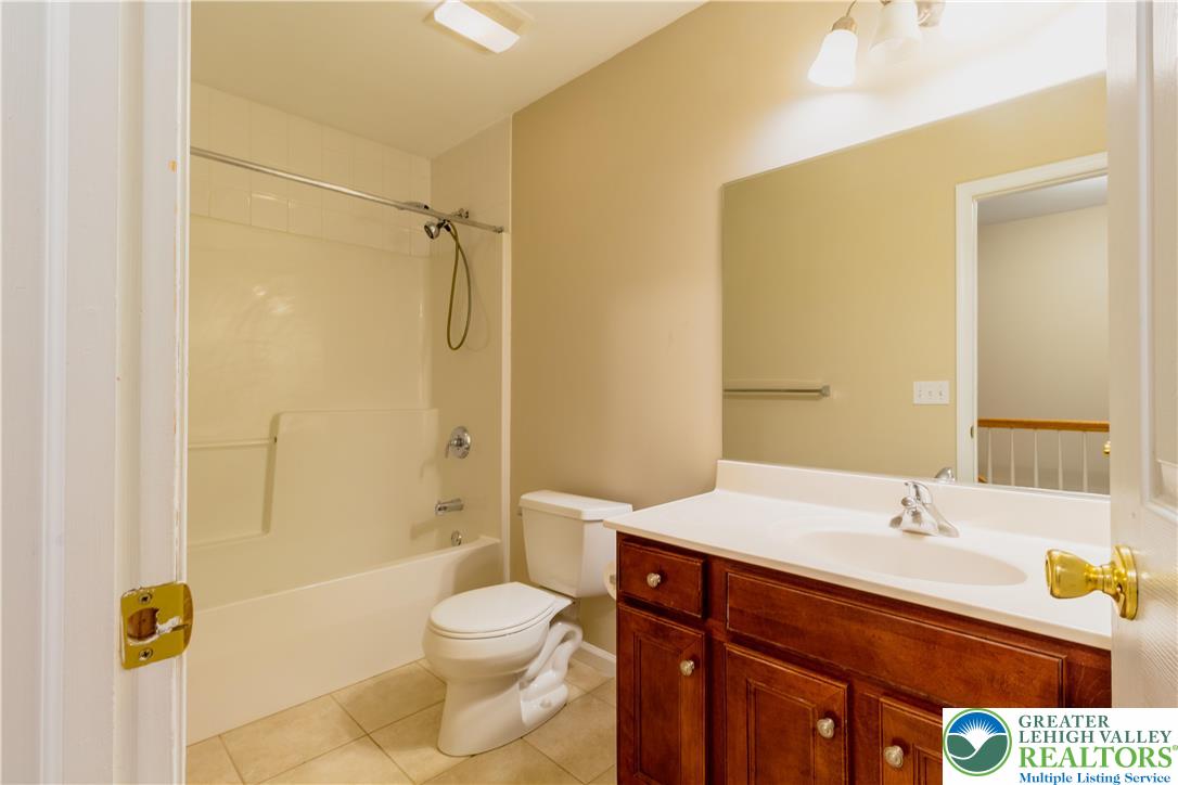 4138 Walter Road Bethlehem, PA 18020 - Photo 29 of 39 a bathroom with a sink a toilet and shower