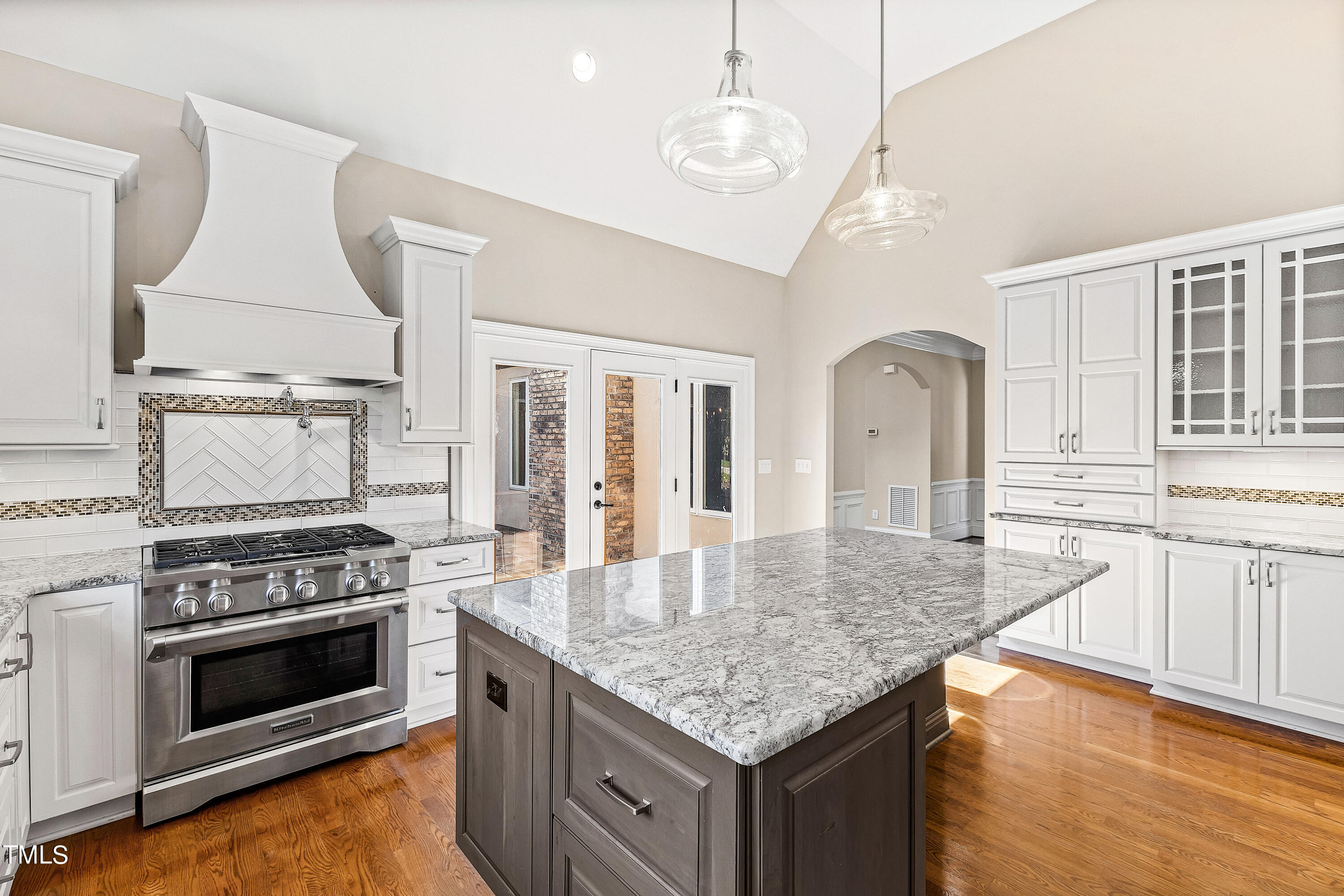 3700 Lark Farm Road Franklinton, NC 27525 - Photo 11 of 87 a kitchen with stainless steel appliances granite countertop a stove and cabinets