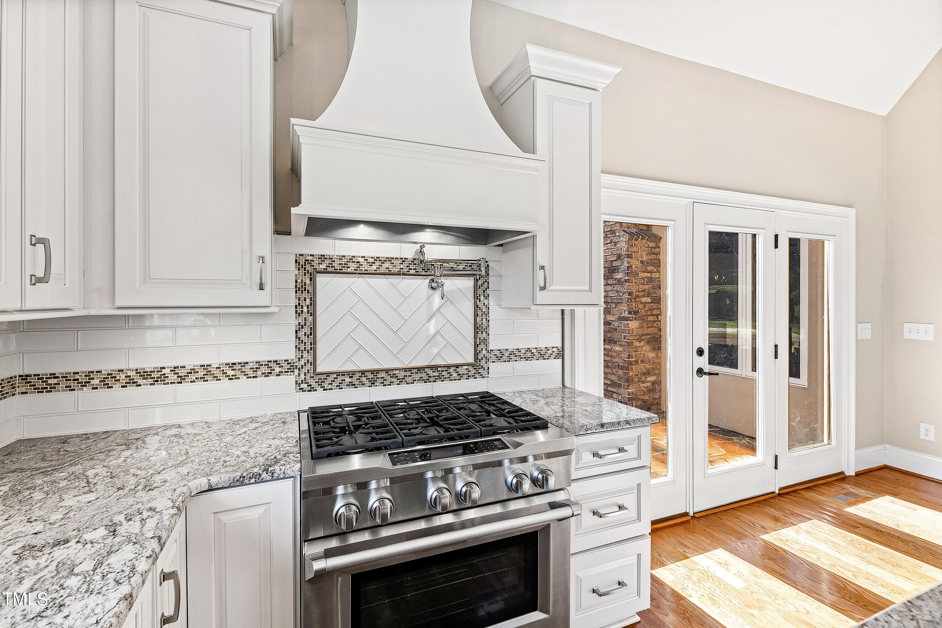 3700 Lark Farm Road Franklinton, NC 27525 - Photo 13 of 87 a stove top oven sitting inside of a kitchen