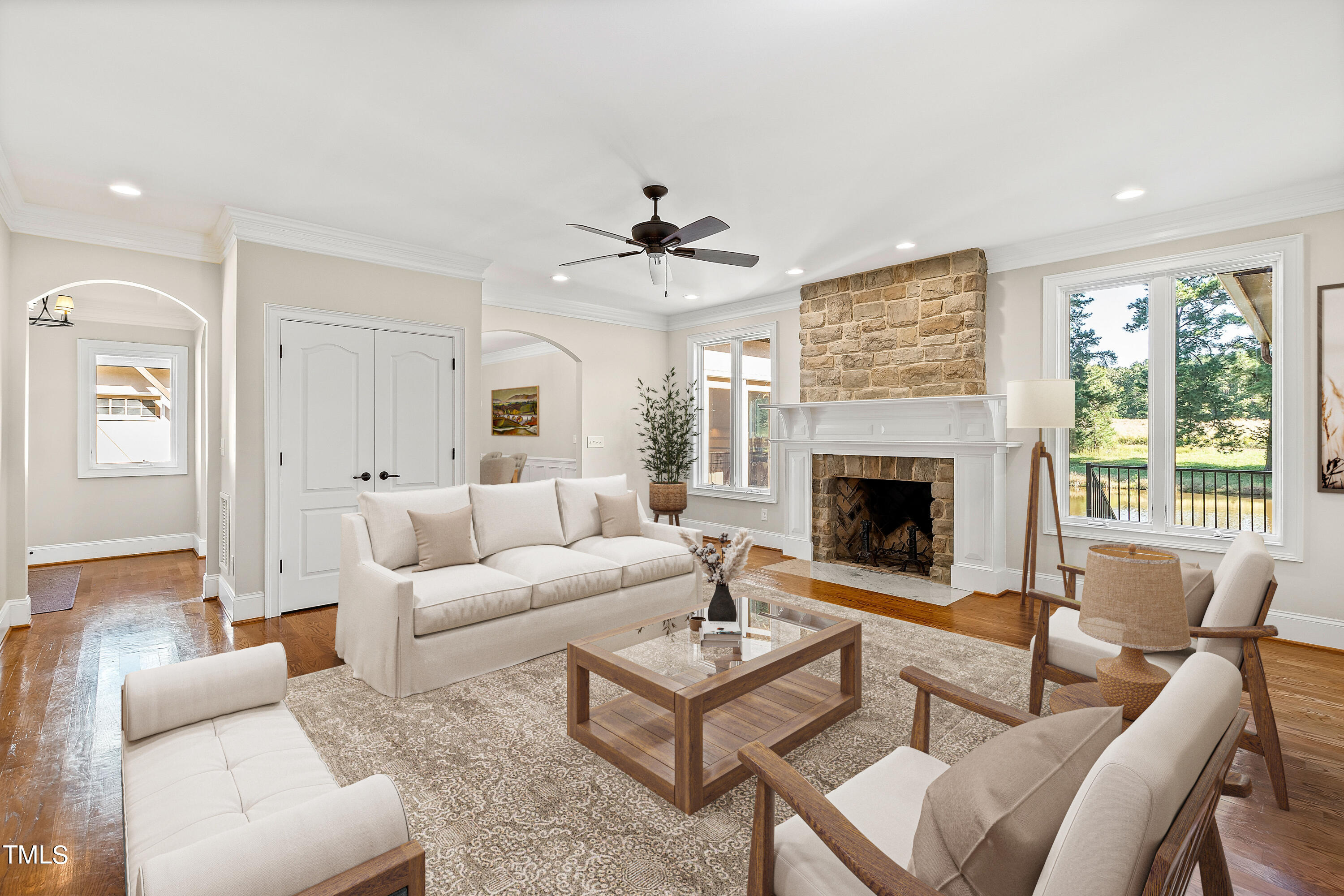 3700 Lark Farm Road Franklinton, NC 27525 - Photo 15 of 87 a living room with furniture a fireplace and a large window