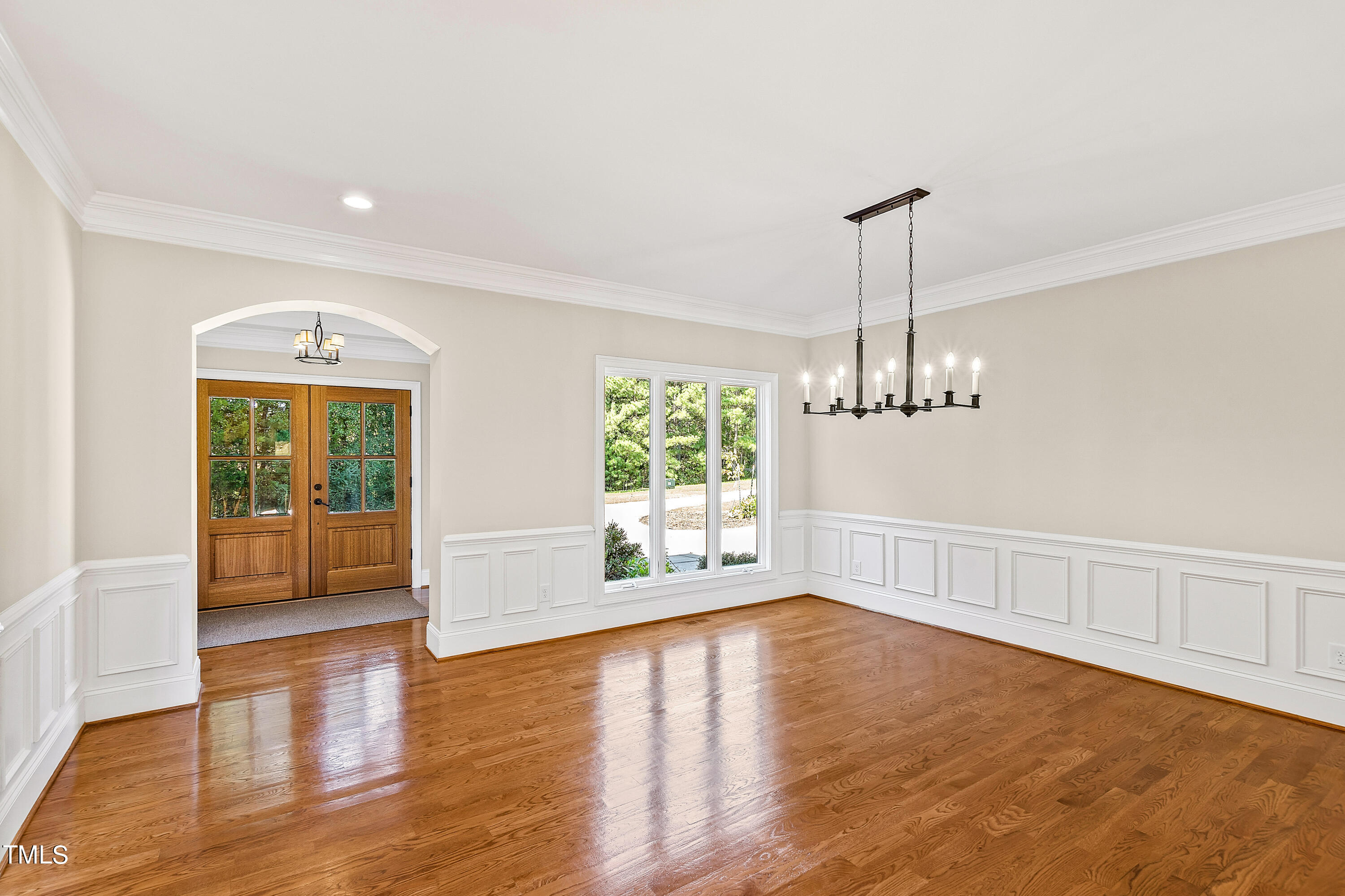 3700 Lark Farm Road Franklinton, NC 27525 - Photo 17 of 87 a view of an empty room with wooden floor and a window
