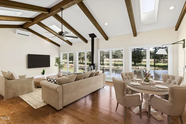 a view of a bathroom with sink and wooden floor