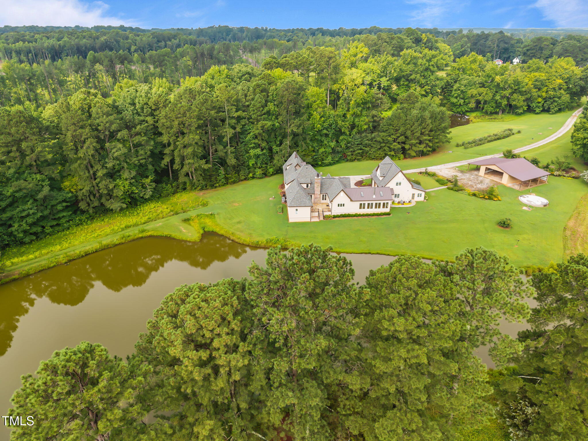 3700 Lark Farm Road Franklinton, NC 27525 - Photo 3 of 87 a view of a lake with a mountain