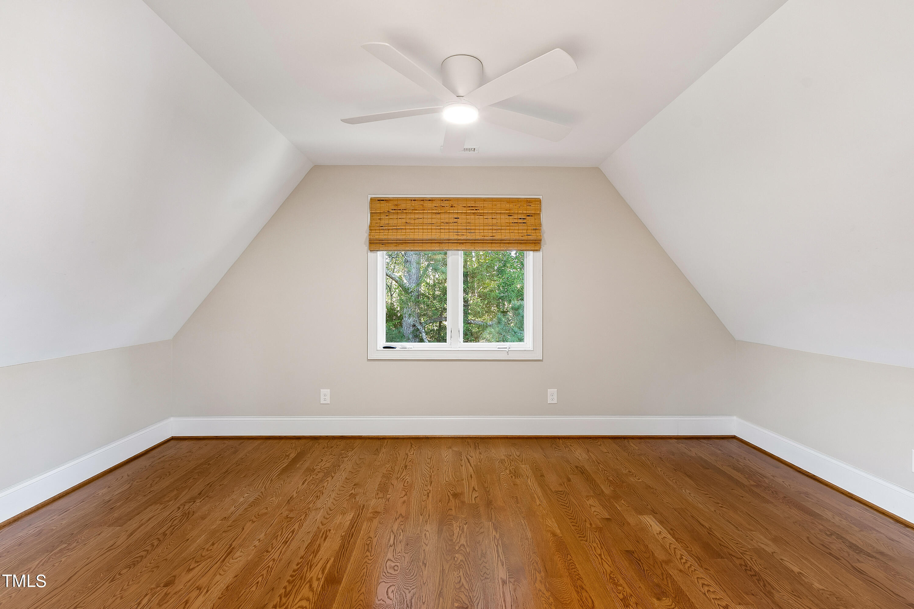 3700 Lark Farm Road Franklinton, NC 27525 - Photo 47 of 87 an empty room with a window and wooden floor