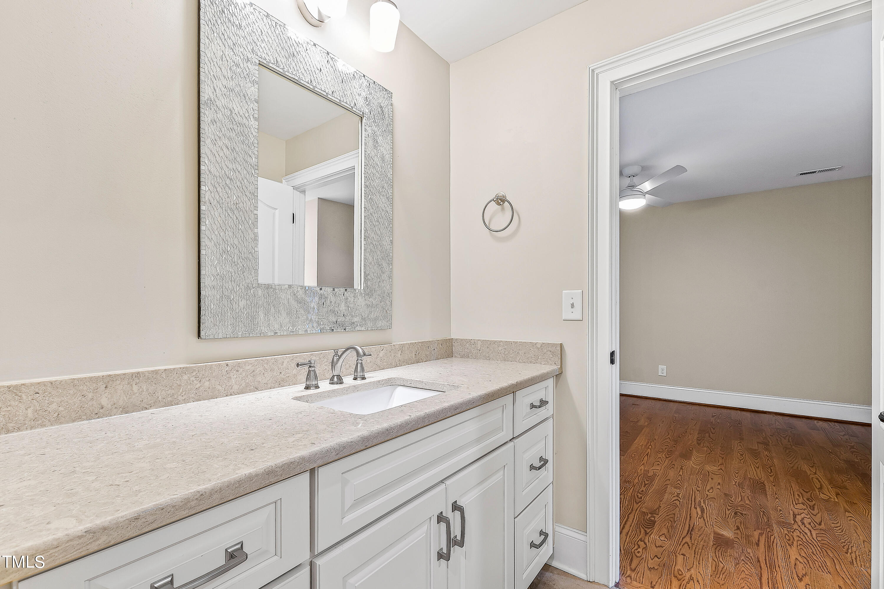 3700 Lark Farm Road Franklinton, NC 27525 - Photo 56 of 87 a bathroom with a sink a vanity and a mirror