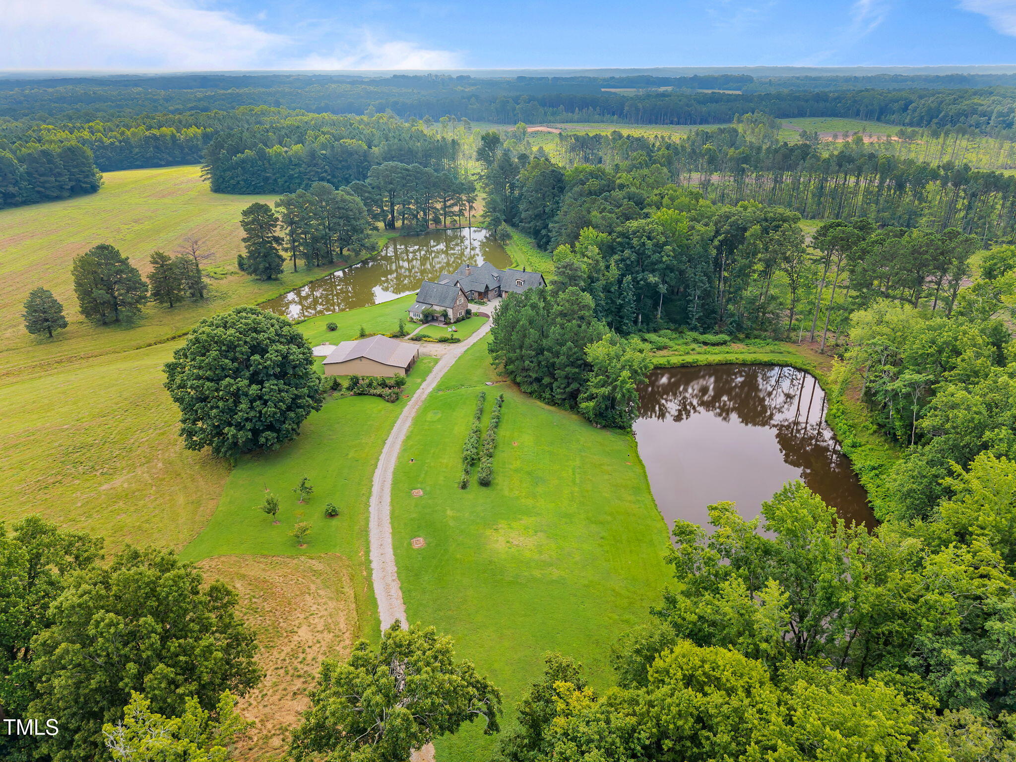 3700 Lark Farm Road Franklinton, NC 27525 - Photo 83 of 87 a view of a lake with a yard