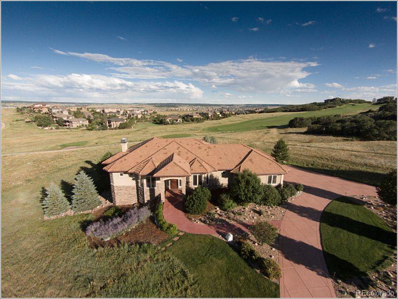 4969 Starry Sky Way Parker, CO 80134 - Photo 1 of 1 a view of a lake with a mountain