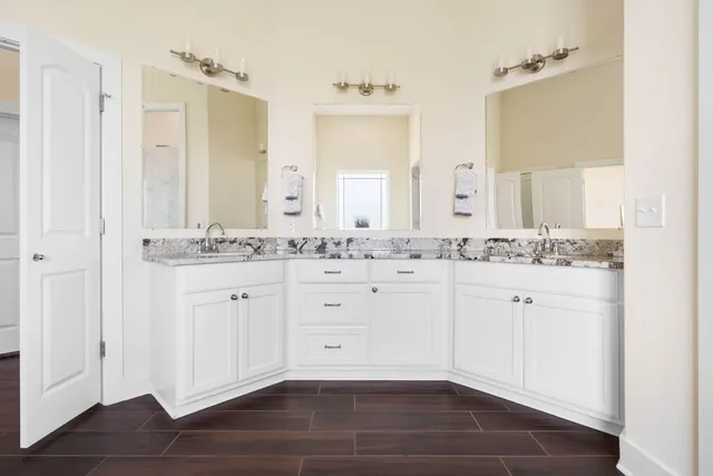 a bathroom with a bathtub and a toilet