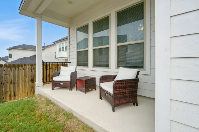 a bench sitting in front of a building
