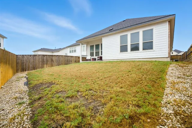 a view of a house with a swimming pool