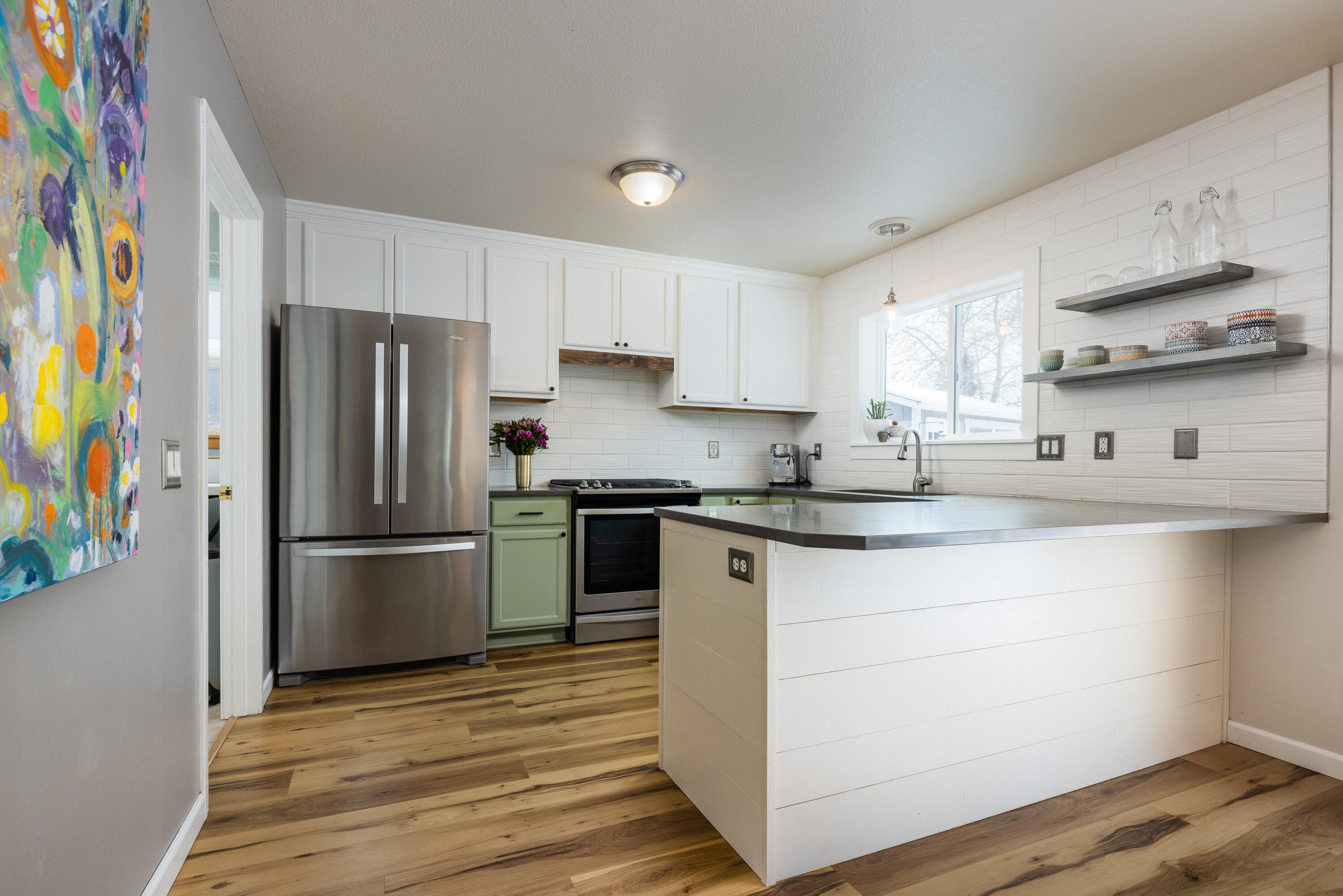 20045 Old Rock House Road Bend, OR 97702 - Photo 10 of 27 Upgraded with new stainless appliances & full height cabinetry.