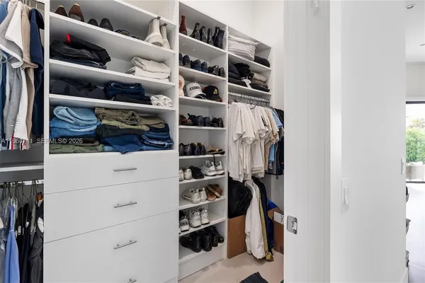 a bathroom with a bathtub and a sink